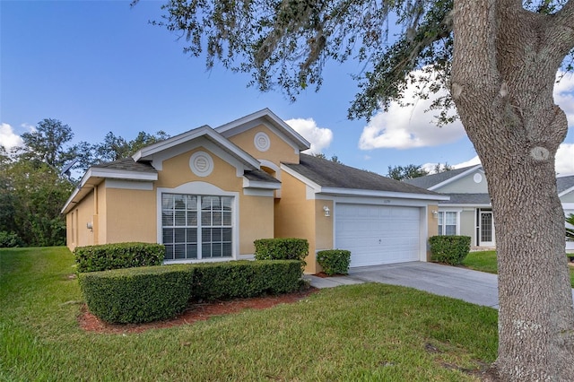 ranch-style home with a front yard and a garage