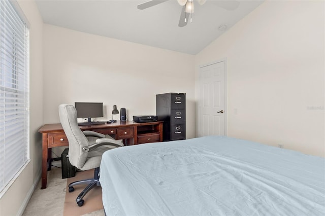 bedroom featuring light colored carpet, ceiling fan, and lofted ceiling