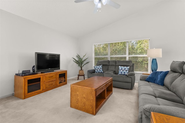 carpeted living room with high vaulted ceiling and ceiling fan