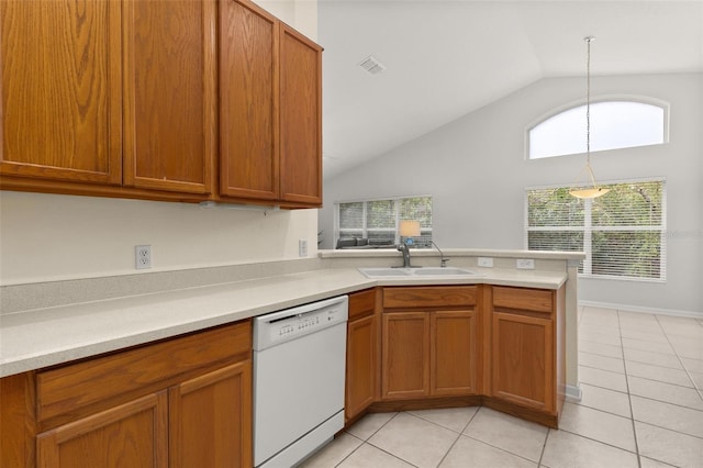 kitchen featuring white dishwasher, vaulted ceiling, plenty of natural light, and sink