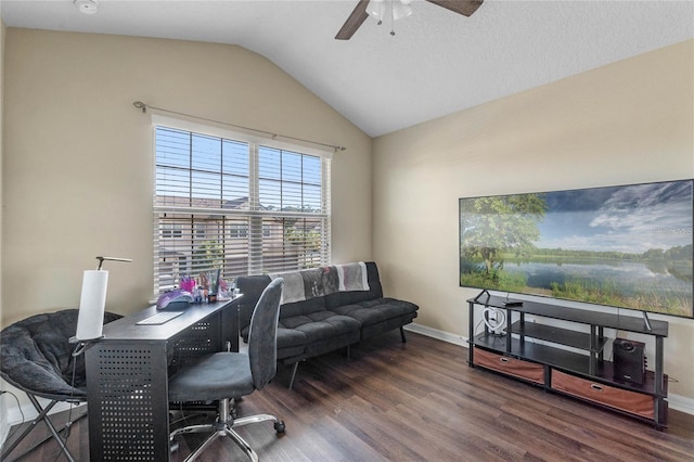 office area featuring dark hardwood / wood-style floors, ceiling fan, and lofted ceiling