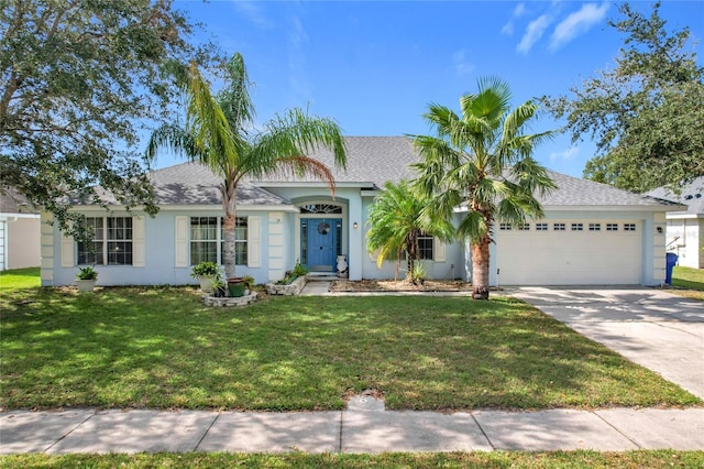 ranch-style house with a front yard and a garage