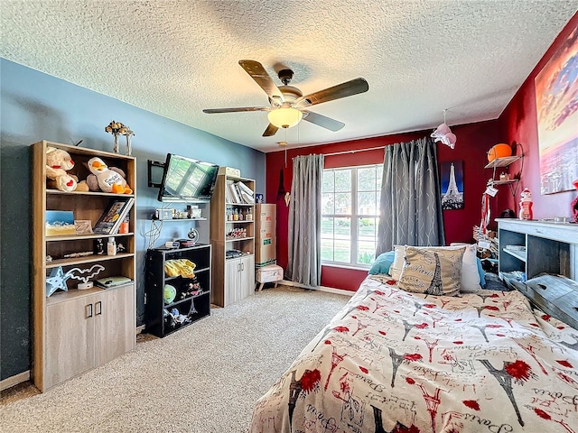 bedroom with light carpet, ceiling fan, and a textured ceiling