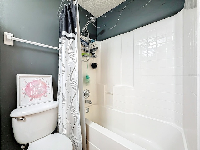 bathroom featuring a textured ceiling, toilet, and shower / bathtub combination with curtain