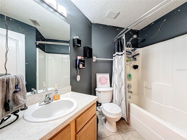 full bathroom with tile patterned floors, vanity, a textured ceiling, and shower / tub combo with curtain