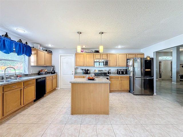 kitchen featuring light tile patterned flooring, sink, appliances with stainless steel finishes, decorative light fixtures, and a kitchen island