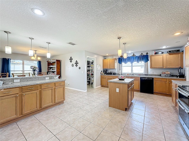 kitchen with dishwasher, a center island, hanging light fixtures, and a wealth of natural light