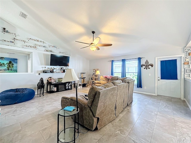 living room featuring ceiling fan and vaulted ceiling