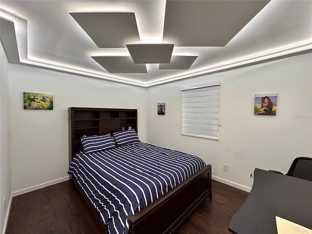 bedroom with dark wood-type flooring