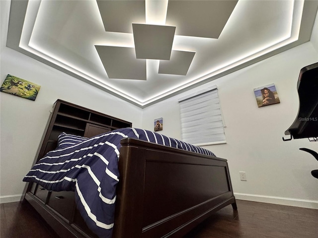 bedroom featuring dark hardwood / wood-style floors