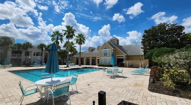 view of pool featuring a patio area