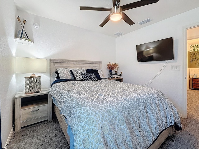 bedroom with dark carpet and ceiling fan