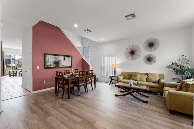 131 Cadiz Loop, Davenport, FL 33837 - living area featuring light wood finished floors, baseboards, and recessed lighting