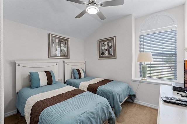 carpeted bedroom featuring ceiling fan and lofted ceiling