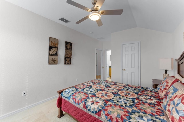 bedroom featuring ceiling fan, light carpet, and vaulted ceiling