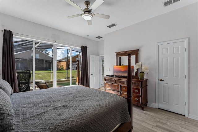 bedroom featuring access to exterior, ceiling fan, and light wood-type flooring