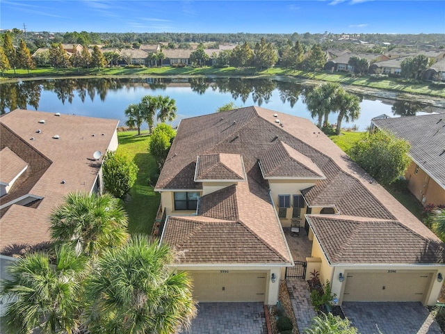 drone / aerial view with a water view