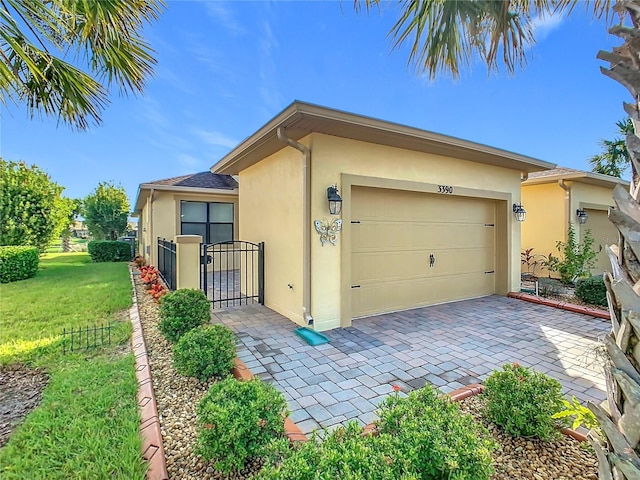 exterior space with a yard and a garage