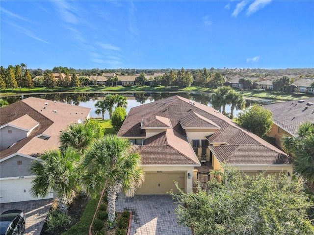 birds eye view of property featuring a water view