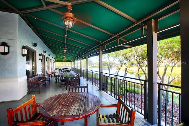 view of patio with a water view