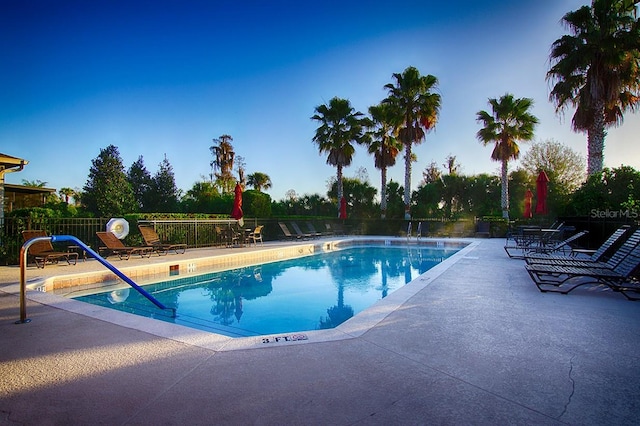 view of swimming pool featuring a patio area