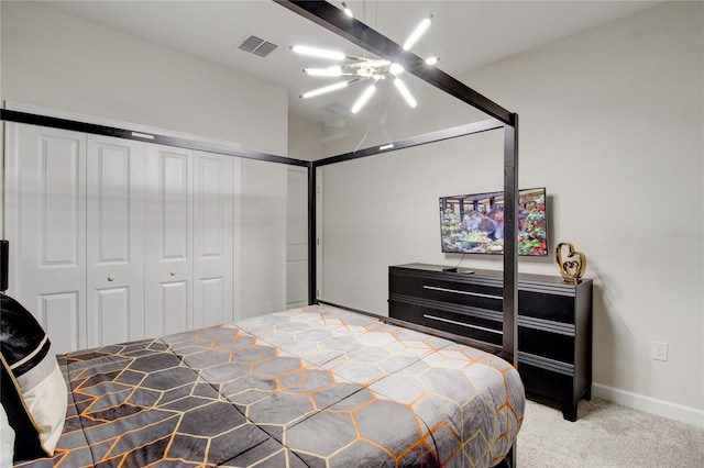 carpeted bedroom with a closet