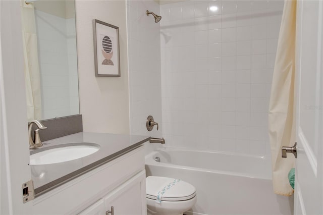 full bathroom featuring shower / bath combo, toilet, and vanity