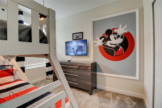 712 Whistling Straits Blvd, Davenport, FL 33896 - carpeted bedroom featuring baseboards and multiple windows