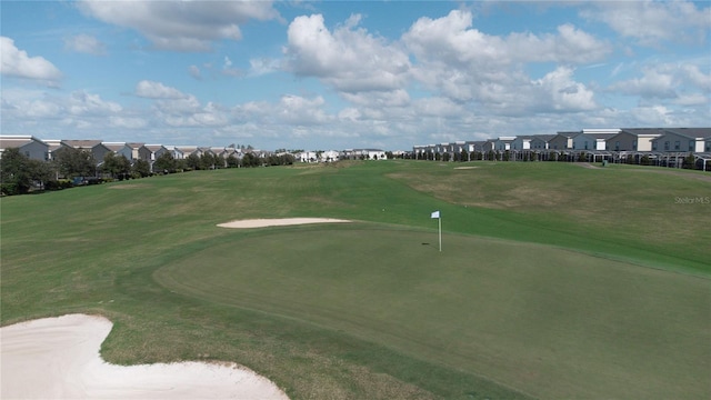 712 Whistling Straits Blvd, Davenport, FL 33896 - view of property's community with golf course view, a putting green, and a residential view