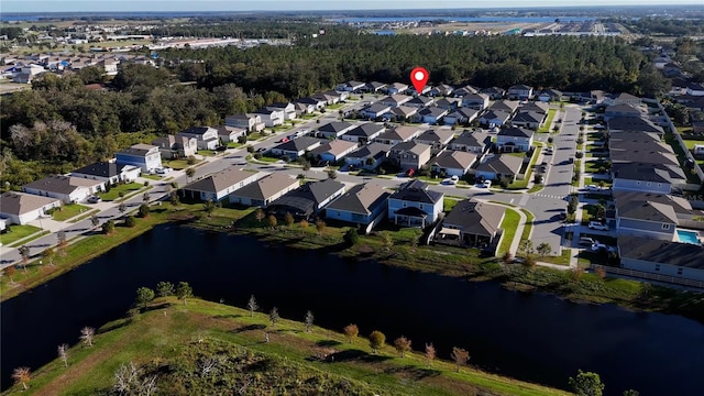 bird's eye view with a water view