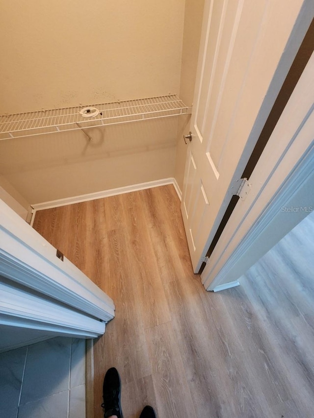 interior space with hardwood / wood-style flooring