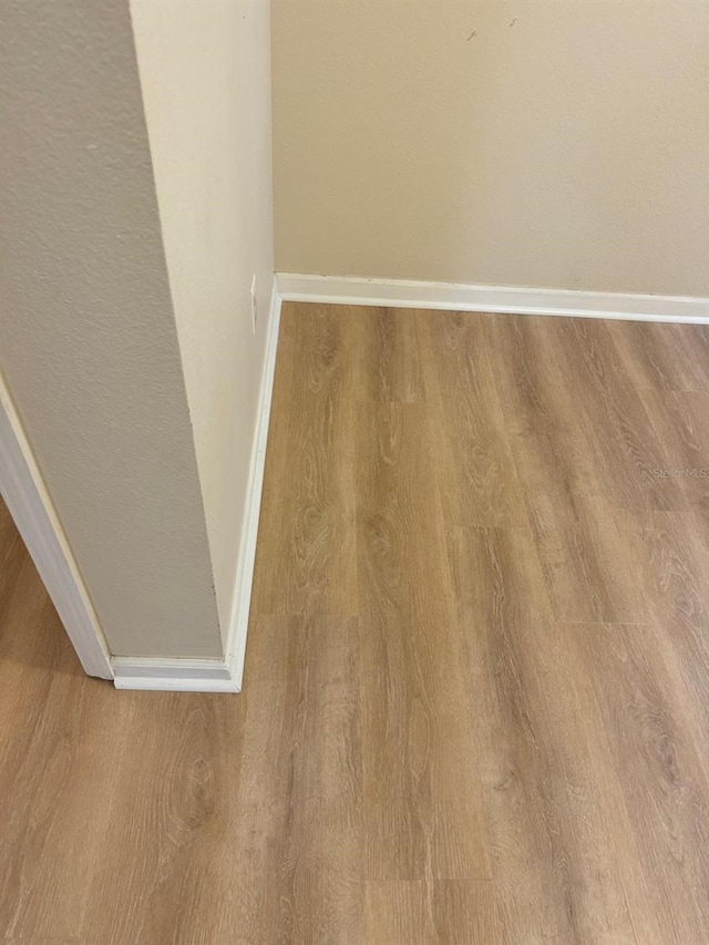 details featuring hardwood / wood-style flooring