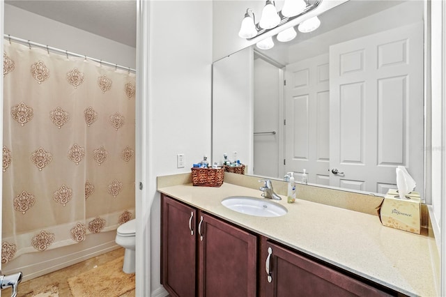 full bathroom featuring vanity, toilet, and shower / tub combo with curtain