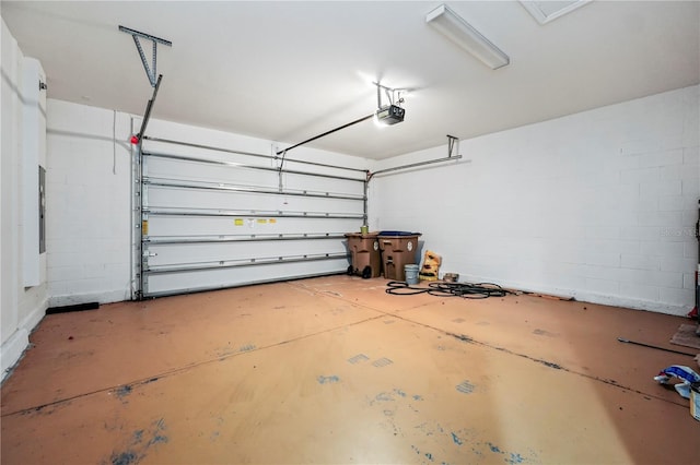 garage featuring a garage door opener