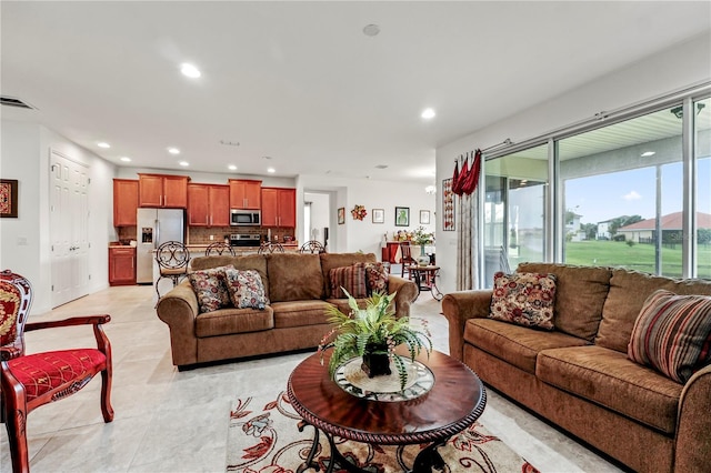 living room with light tile patterned floors