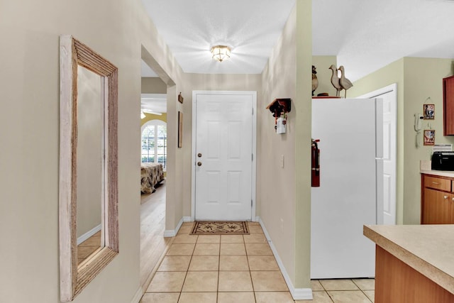 2216 Mystic Ring Loop, Poinciana, FL 34759 - foyer entrance featuring light tile patterned floors