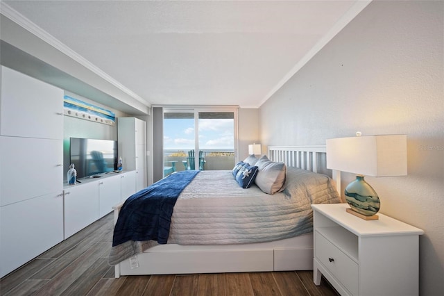 bedroom with dark hardwood / wood-style floors, expansive windows, and crown molding