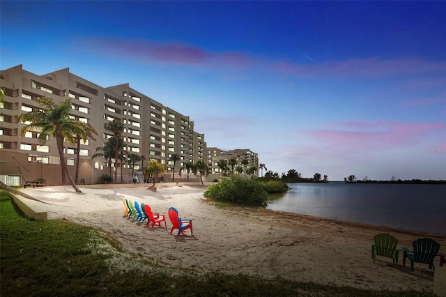 view of home's community with a water view