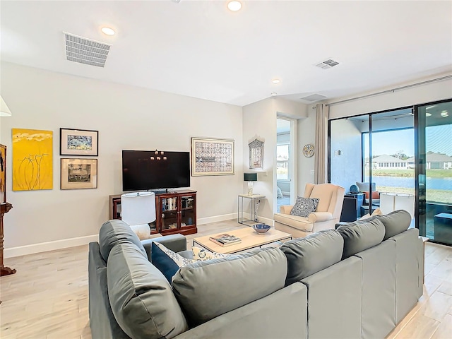 living room with light wood-type flooring