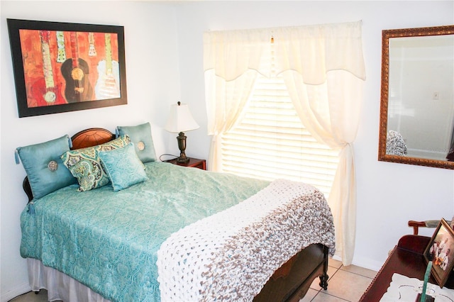 1053 Hemingway Dr, Deltona, FL 32725 - bedroom with tile patterned floors and baseboards