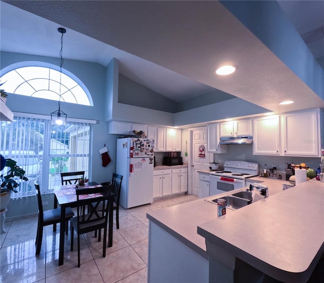 kitchen with white cabinetry, hanging light fixtures, kitchen peninsula, lofted ceiling, and white appliances