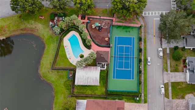 birds eye view of property featuring a water view