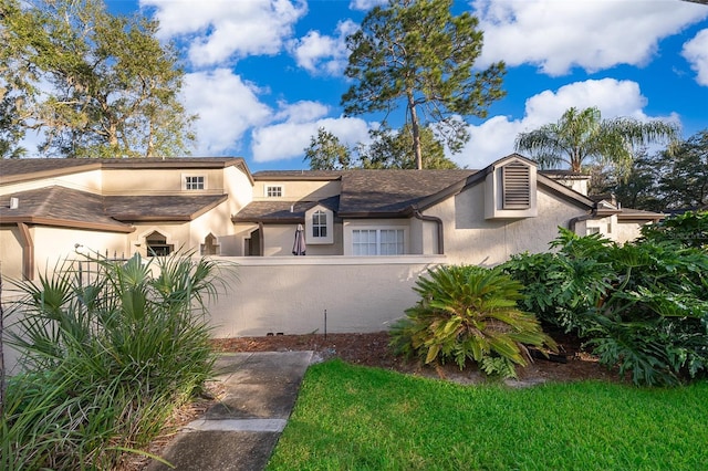 1423 Farrindon Cir Unit 1423, Lake Mary, FL 32746 - view of front of property featuring stucco siding