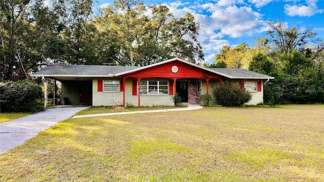 ranch-style home with a front lawn and a carport