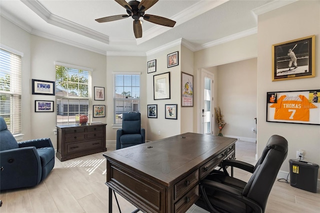 home office featuring light hardwood / wood-style floors, ceiling fan, a healthy amount of sunlight, and ornamental molding