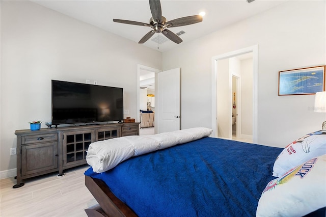 bedroom with light wood-type flooring and ceiling fan