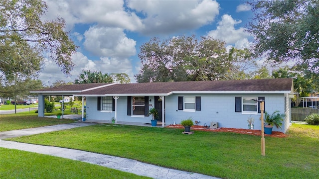 single story home with a carport and a front lawn