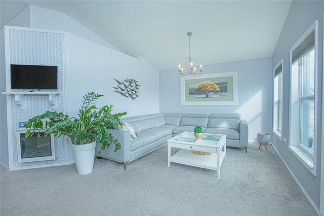 carpeted living room featuring a notable chandelier, lofted ceiling, and a wealth of natural light