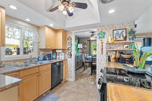 kitchen with dishwasher, light brown cabinets, stove, a raised ceiling, and sink