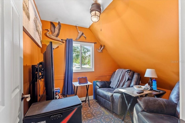 bonus room with ceiling fan and vaulted ceiling